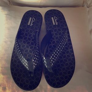 Clark’s black and silver sandals